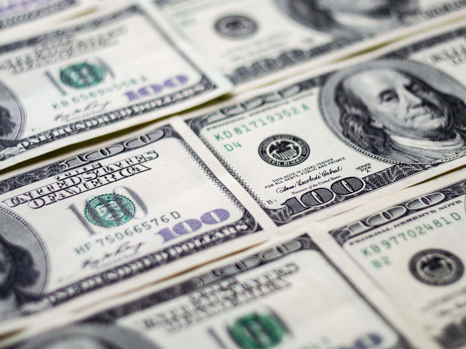 Close up of United States $100 bills.