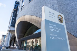 California Department of Public Health sign in front of office building.