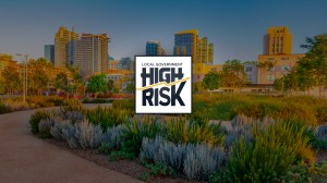 Local Government High Risk logo on park with buildings in the background