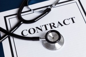 stethoscope with contract document